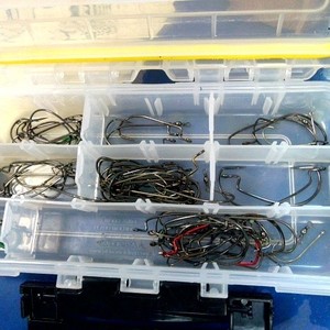 Plano tackle box with hooks