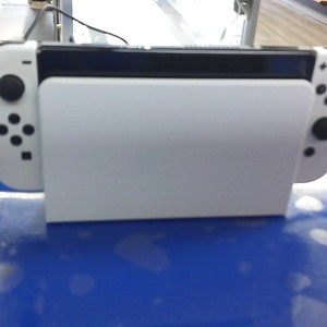 Nintendo SWITCH OLED and Charging station