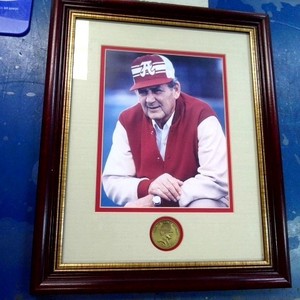 Bear Bryant Framed Photo Wearing Red Jacket with Alabama Ballcap