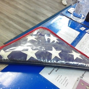 Large American Flag Folded In Plastic